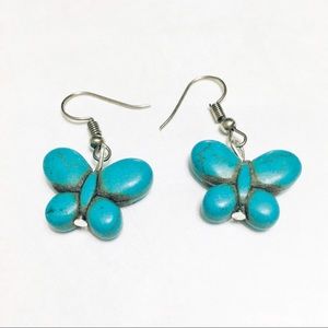 3/$15 Dangling light blue butterfly earrings
